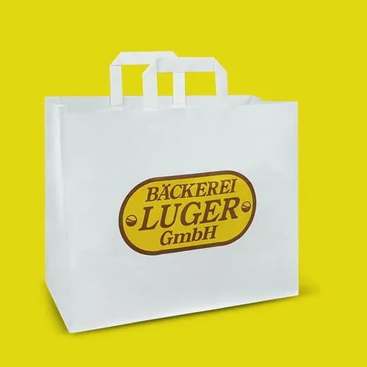 Nachhaltige Papiertragetaschen mit individuellem Logo aus Tirol – Perfekt für Ihre Firmenfeier