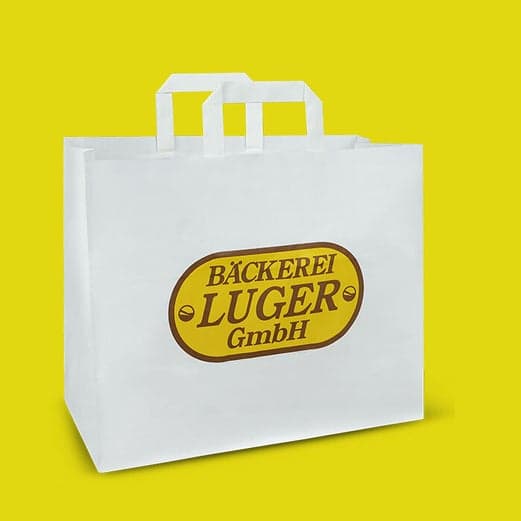 Nachhaltige Papiertragetaschen mit individuellem Logo aus Tirol – Perfekt für Ihre Firmenfeier